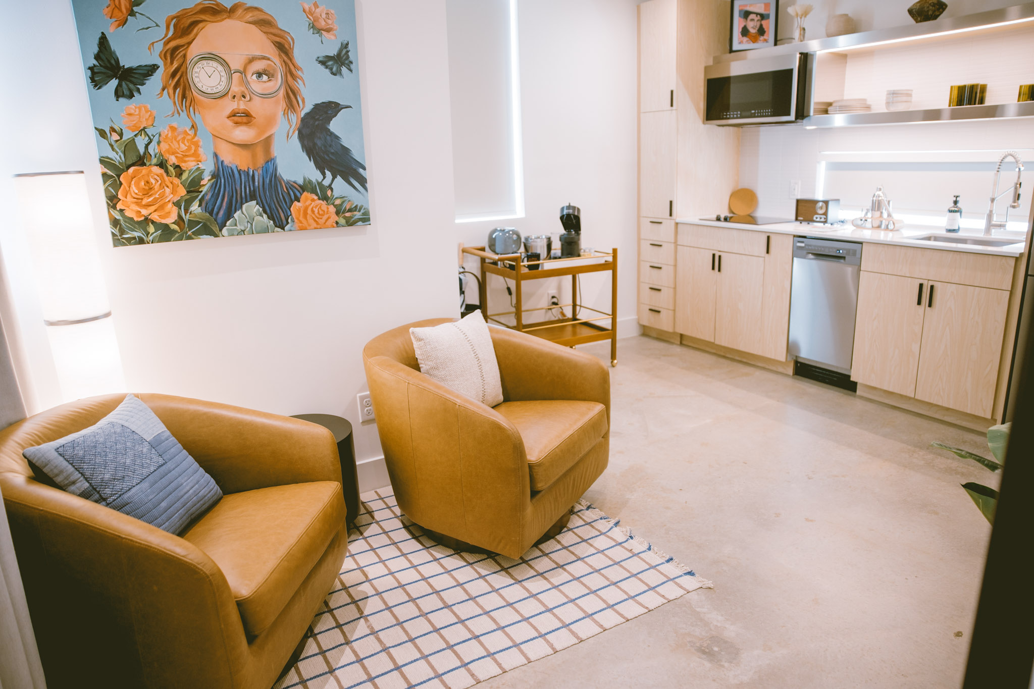 Golden-hour courtyard with Airstream suites at Hotel SOMA